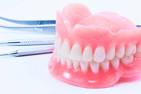 Próteses dentárias fixas e removíveis prótese dentária